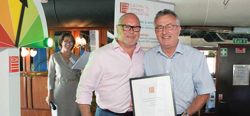 Steve Stark of Ledvance collects the EDA Affiliate Engagement Award for 2018/19 from EDA President Chris Gibson