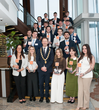 EDA-Learning-Achievement-Award-Winners-2026-group-shot-with-the-EDA-president,-David-Moore