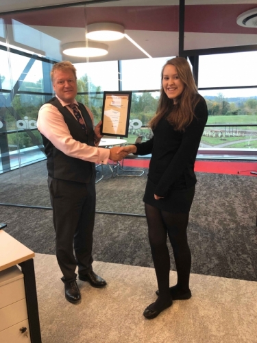 AICO Apprentice, Steph Wale-Walton, receiving his certificate from Managing Director, Neal Hooper