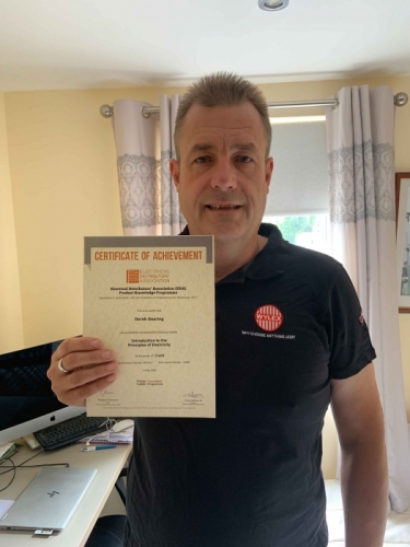 Business Development Manager, Derek Gearing, of Electrium with his Credit certificate for his first module Introduction to the Principles of Electricity.