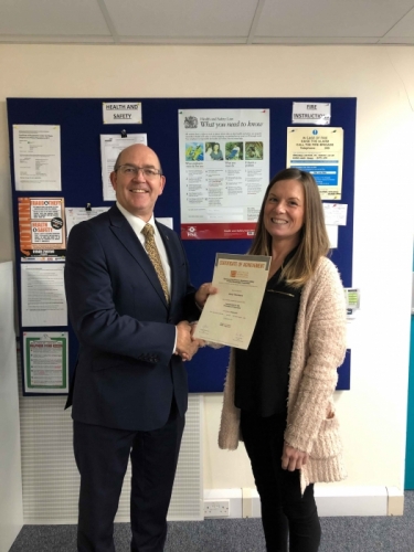 Peter Brittain, Edmundson Electrical Ltd, Wales & West Regional director presenting Cheryl Thornbery with her certificate