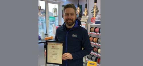 ABM Electrical Managing Director, Mark Aswhorth, with his Distinction certificate for his first module Introduction to the Principles of Electricity