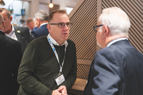 Delegates network over coffee