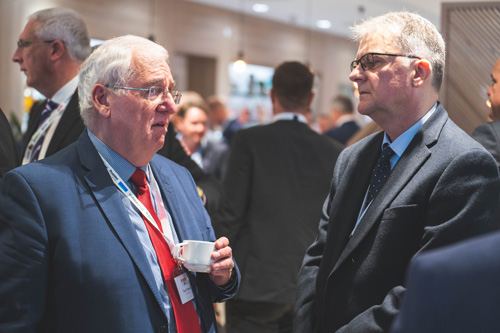 Delegates network over coffee