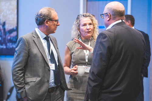 Delegates network over coffee