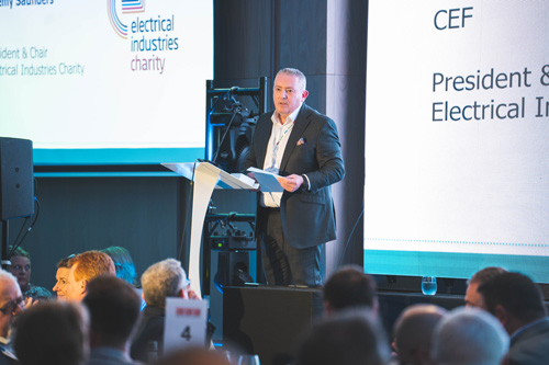 Jeremy Saunders asks guests to donate to the Electrical Industries Charity