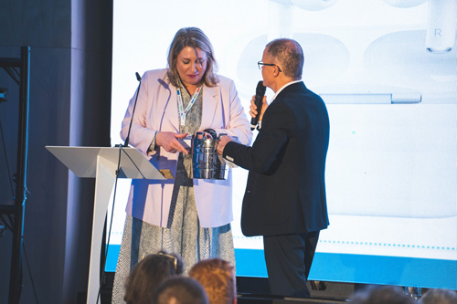 Dominic Holland & Anne Vessey present charity raffle prizes