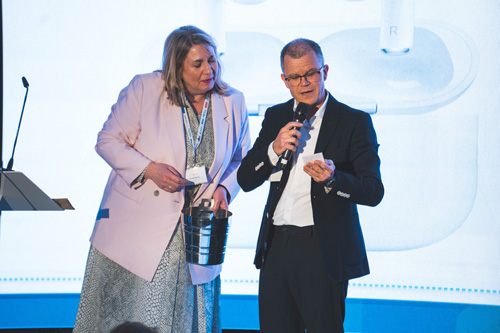 Anne Vessey & Dominic Holland announce raffle winner 