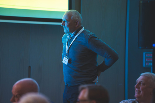 Raffle winner heads to the stage to receive his prize