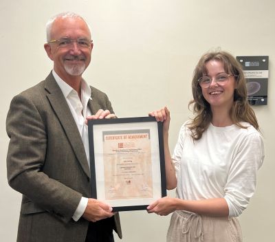 Alex Curling being presented her third EDA  Product Knowledge Module: Lighting (Systems and Controls) by Publications and Services Manager at Stearn Electric Company Limited, Ben Lincoln.  Alex has achieved a Distinction. 