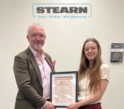 Alex Curling being presented her first EDA  Product Knowledge Module: Introduction to the Principles of Electricity by Publications and Services Manager at Stearn Electric Company Limited, Ben Lincoln.  Alex has achieved a Distinction. 