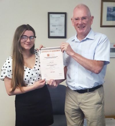 Caitlin James being presented her first EDA Product Knowledge: Introduction to the Principles of Electricity by Managing Director of Consort Equipment Products Ltd , Ed Spankie. Caitlin has achieved a grade: Distinction. 
