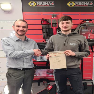 Dale Matthews, achieved a Distinction for his Product Knowledge Module: Lighting (Introduction). Manager Dominic Harrison handing Dale the certificate.