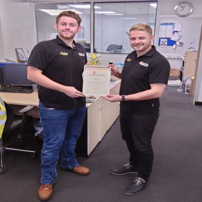 Daniel Knight a Graduate Trainee at Edmundson Electrical Ltd (Ben Tansley an Account Manager at CEF (Daventry Branch) with his Credit in Cables and Cable Management) with his Distinction in the Introduction to the Principles of Electricity 