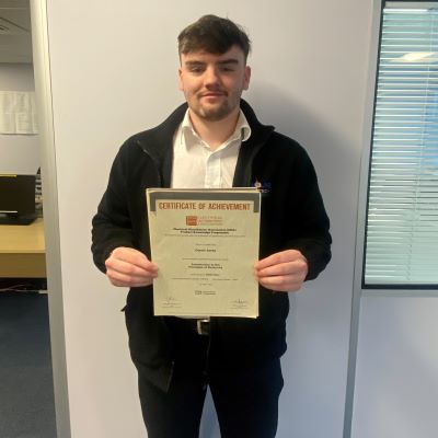 Owain Jones a Graduate Trainee at Edmundson Electrical Ltd (G A Nicholas Salford Branch) with his Distinction in the EDA Product Knowledge Module Introduction to the Principles of Electricity