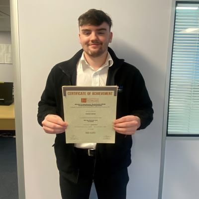 Owain Jones a Graduate Trainee at Edmundson Electrical Ltd (G A Nicholas Salford Branch) with his Distinction in the EDA Product Knowledge Module Wiring Devices and Controls