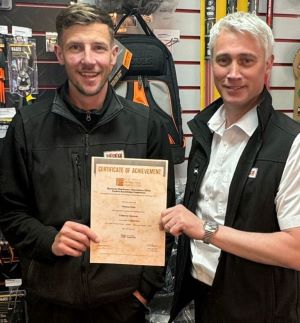 Thomas Potts, being presented his first EDA  Product Knowledge Module: Customer Service by Branch Manager, Andrew Wooding.  Thomas has achieved a Distinction. 